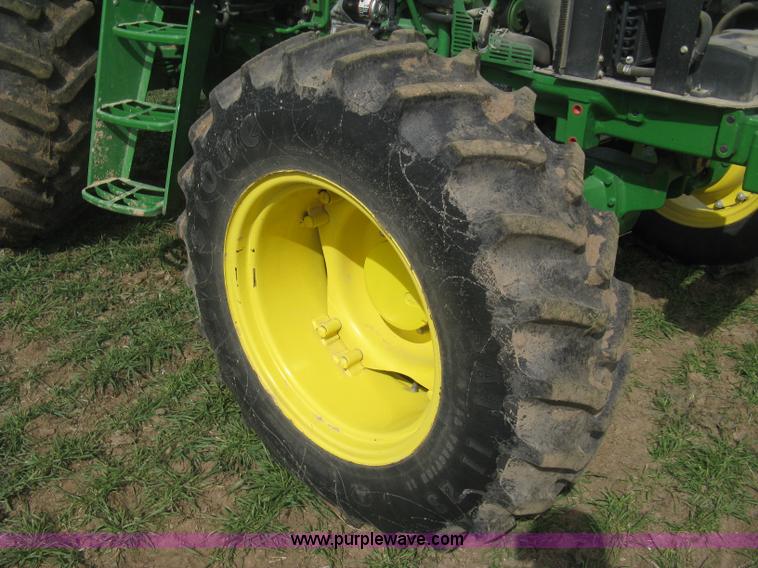 image for item E3358 2009 John Deere 6100D MFWD tractor