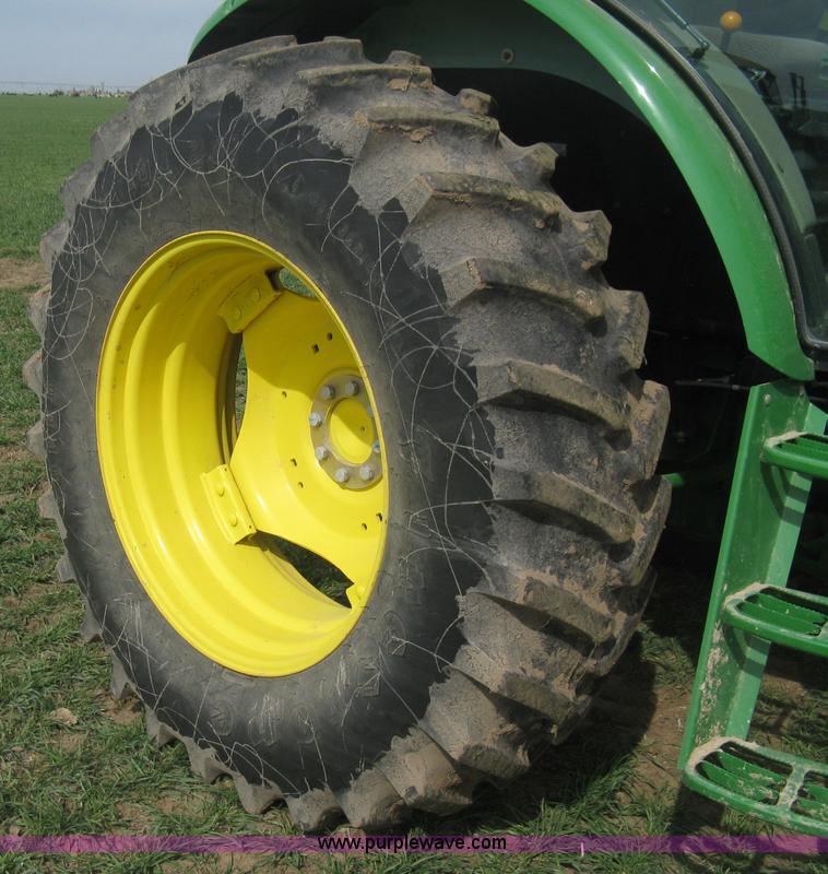 image for item E3358 2009 John Deere 6100D MFWD tractor