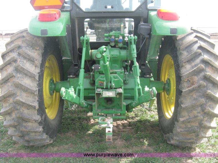 image for item E3358 2009 John Deere 6100D MFWD tractor