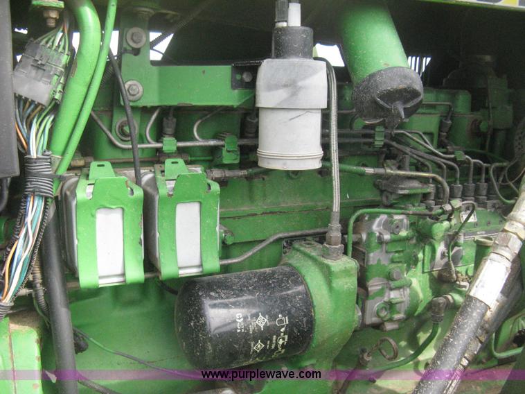 image for item E3359 1988 John Deere 4450 MFWD tractor