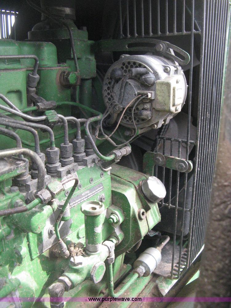 image for item E3359 1988 John Deere 4450 MFWD tractor