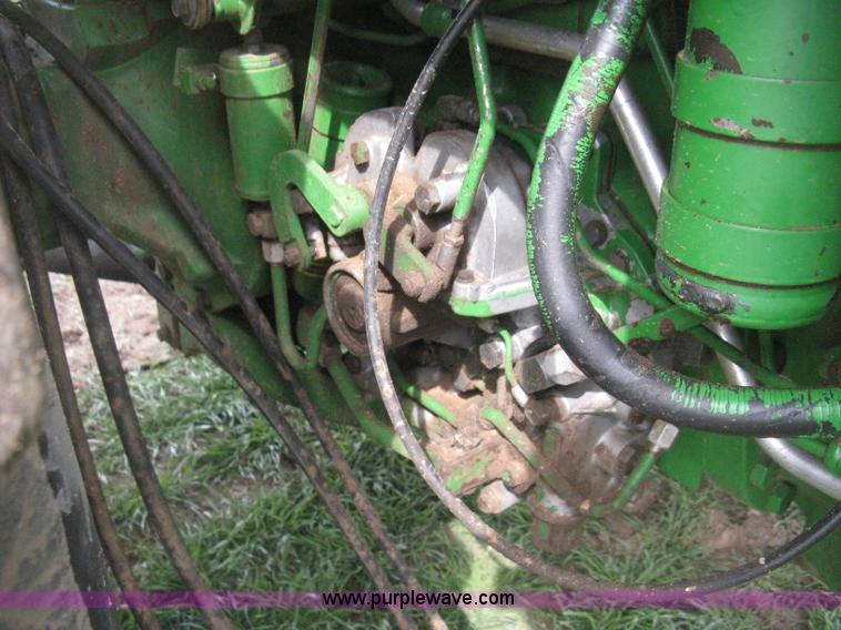 image for item E3359 1988 John Deere 4450 MFWD tractor