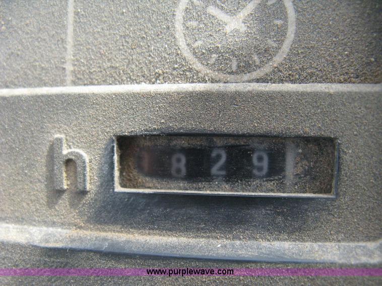 image for item E3359 1988 John Deere 4450 MFWD tractor