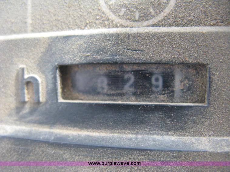 image for item E3359 1988 John Deere 4450 MFWD tractor