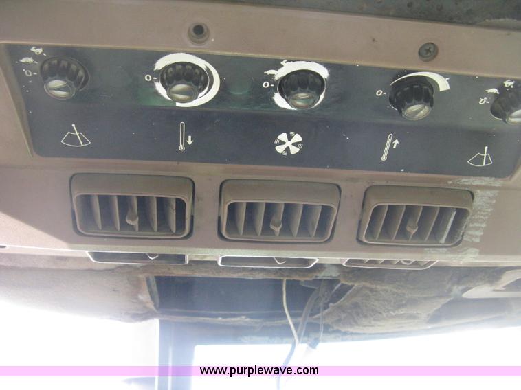 image for item E3359 1988 John Deere 4450 MFWD tractor