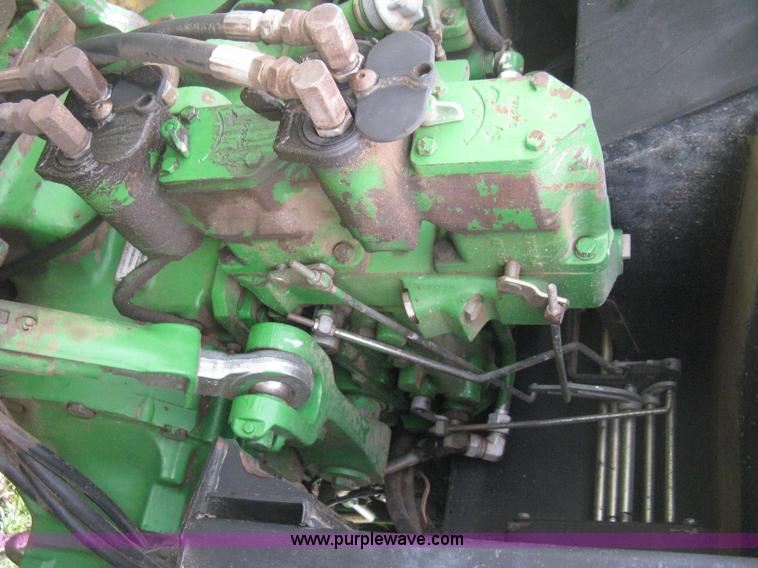 image for item E3359 1988 John Deere 4450 MFWD tractor