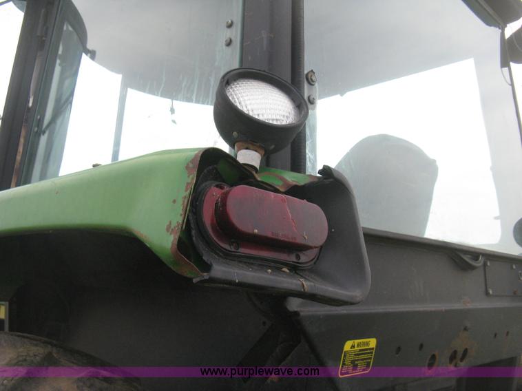 image for item E3359 1988 John Deere 4450 MFWD tractor