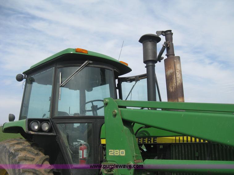 image for item E3359 1988 John Deere 4450 MFWD tractor