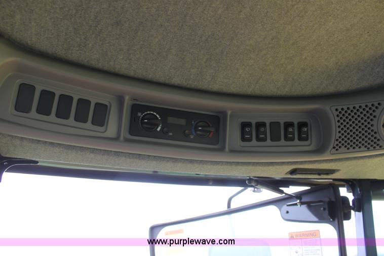 image for item F8710 2012 New Holland H8080 self-propelled swather