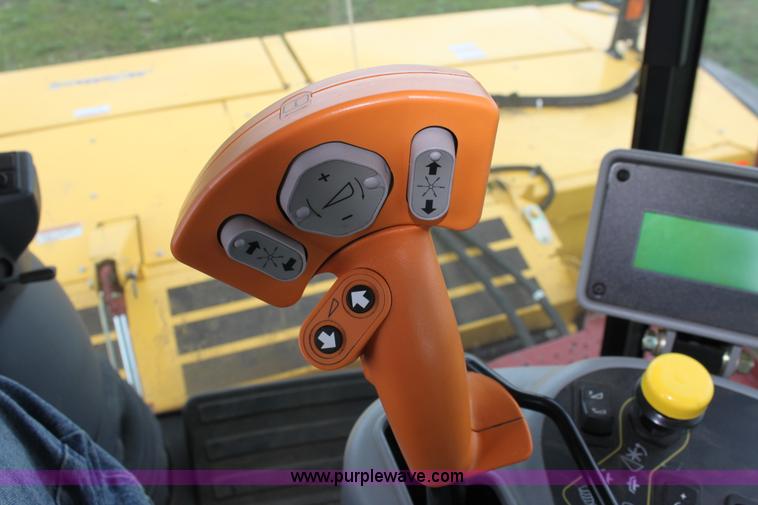 image for item F8710 2012 New Holland H8080 self-propelled swather