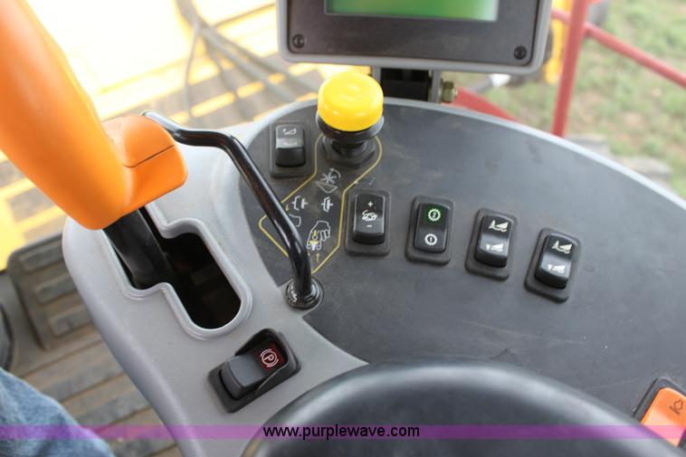 image for item F8710 2012 New Holland H8080 self-propelled swather