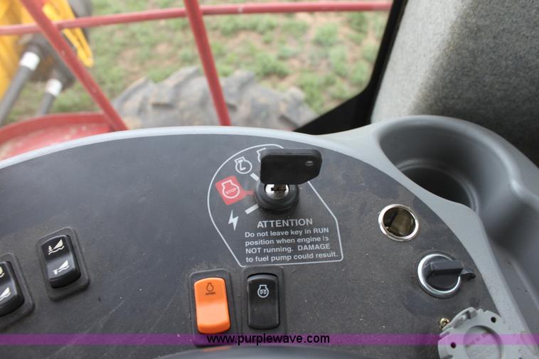 image for item F8710 2012 New Holland H8080 self-propelled swather