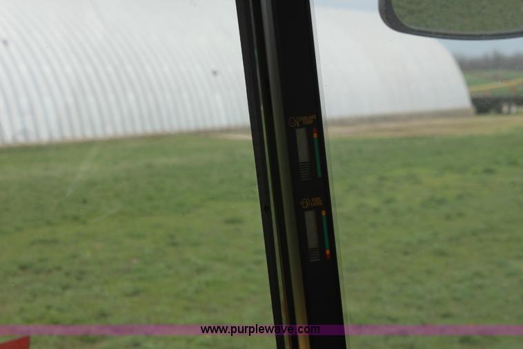 image for item F8710 2012 New Holland H8080 self-propelled swather