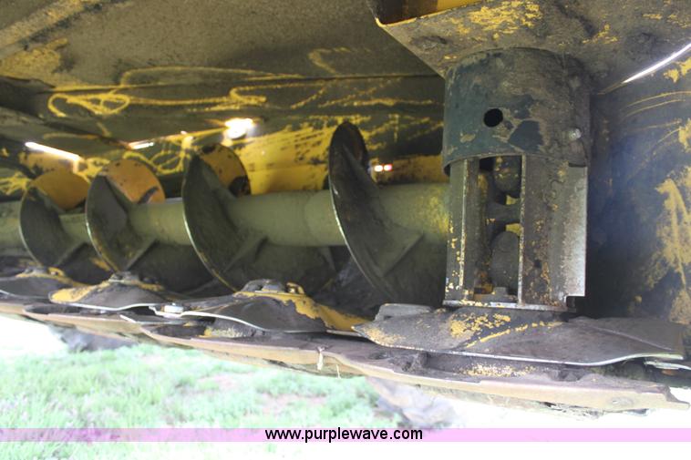 image for item F8710 2012 New Holland H8080 self-propelled swather