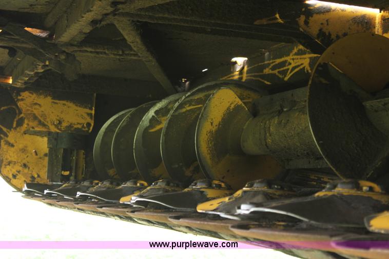 image for item F8710 2012 New Holland H8080 self-propelled swather