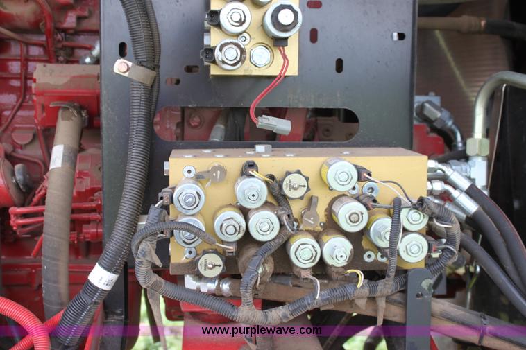 image for item F8710 2012 New Holland H8080 self-propelled swather