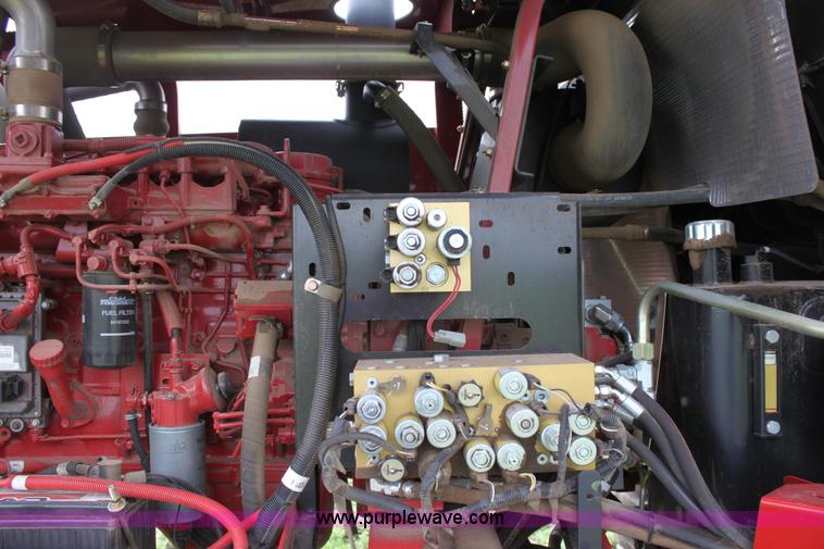 image for item F8710 2012 New Holland H8080 self-propelled swather