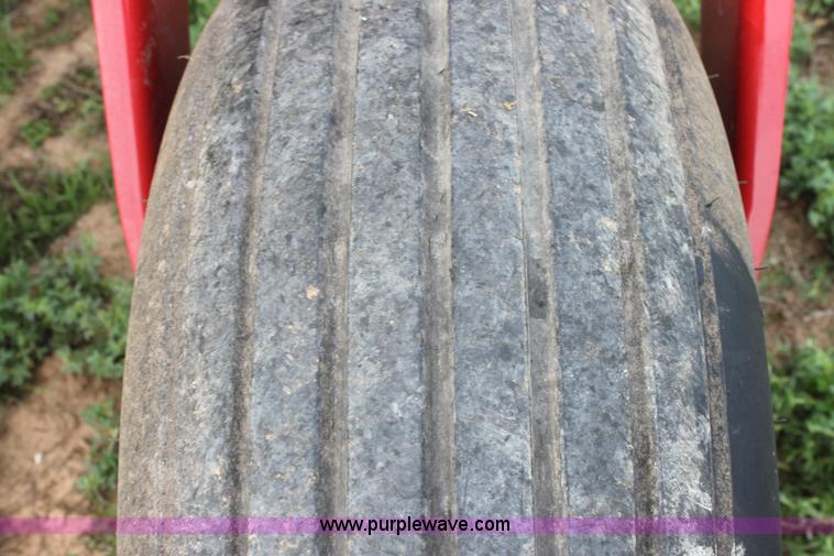 image for item F8710 2012 New Holland H8080 self-propelled swather