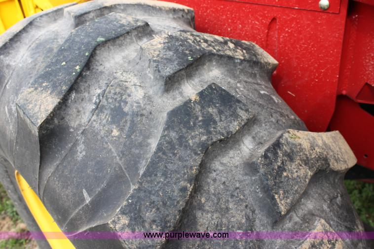 image for item F8710 2012 New Holland H8080 self-propelled swather