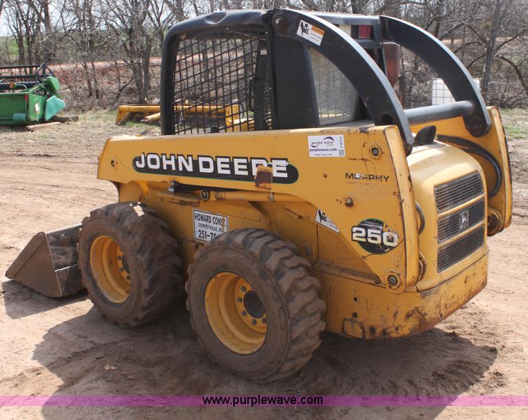image for item F8712 1999 John Deere 250 skid steer