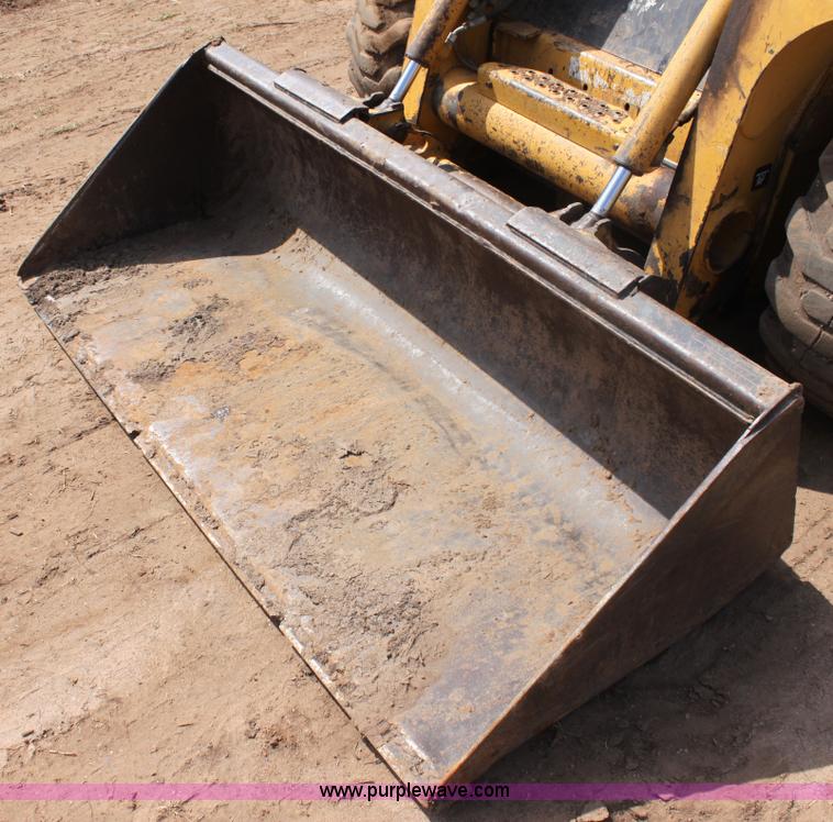 image for item F8712 1999 John Deere 250 skid steer