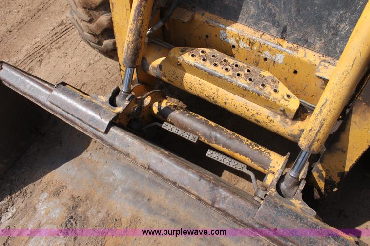 image for item F8712 1999 John Deere 250 skid steer