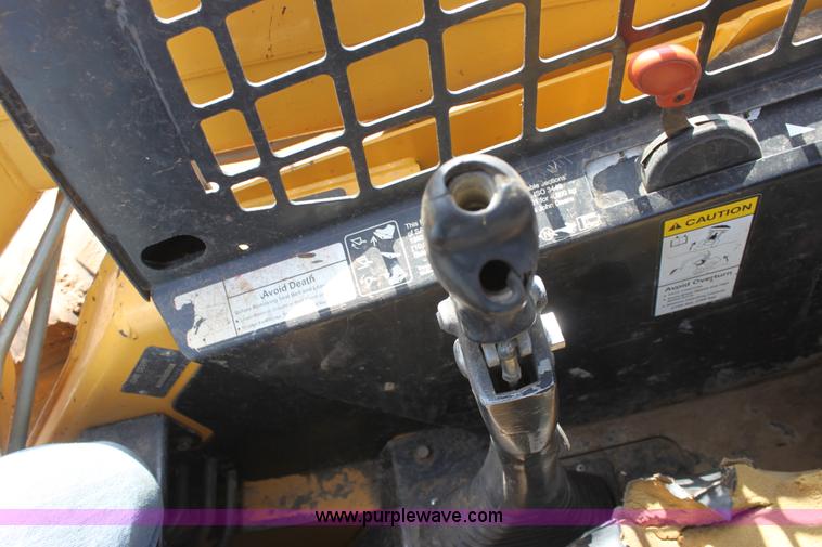 image for item F8712 1999 John Deere 250 skid steer