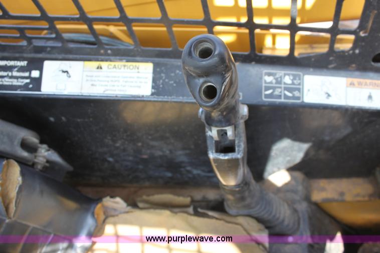 image for item F8712 1999 John Deere 250 skid steer