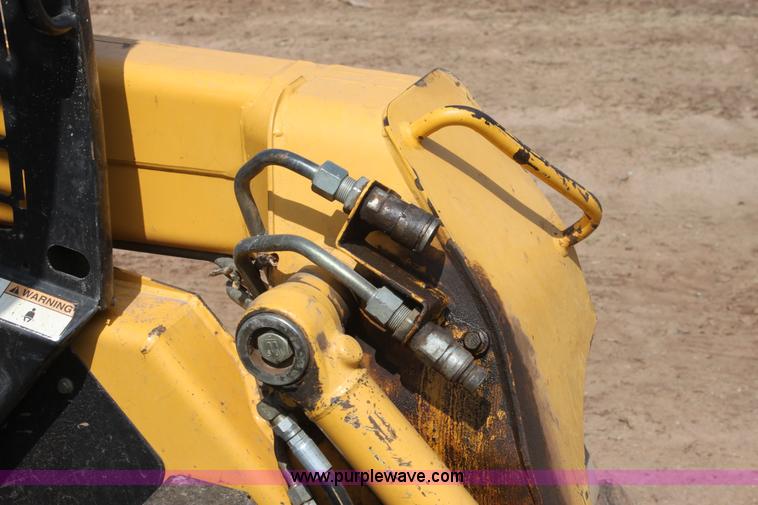 image for item F8712 1999 John Deere 250 skid steer