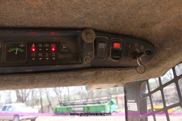 image for item F8712 1999 John Deere 250 skid steer