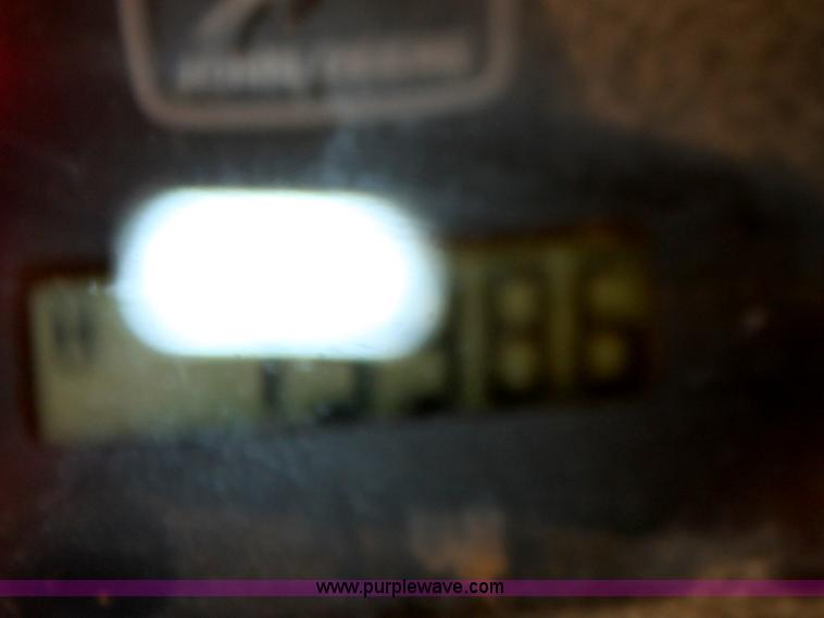 image for item F8712 1999 John Deere 250 skid steer