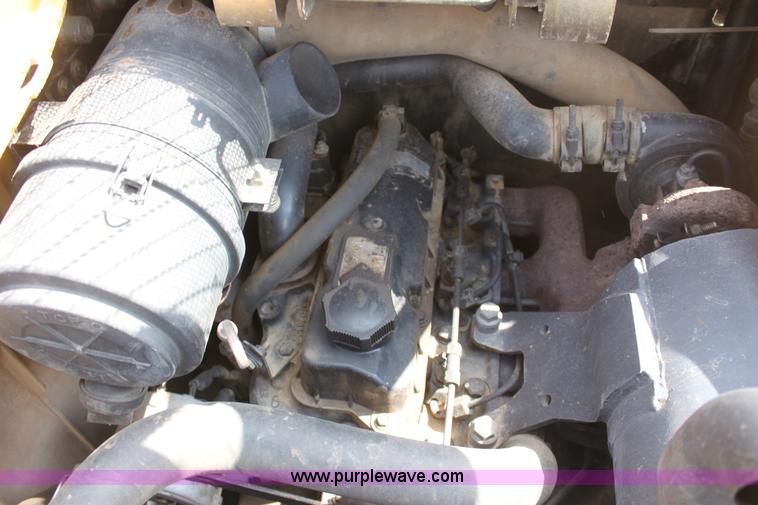 image for item F8712 1999 John Deere 250 skid steer