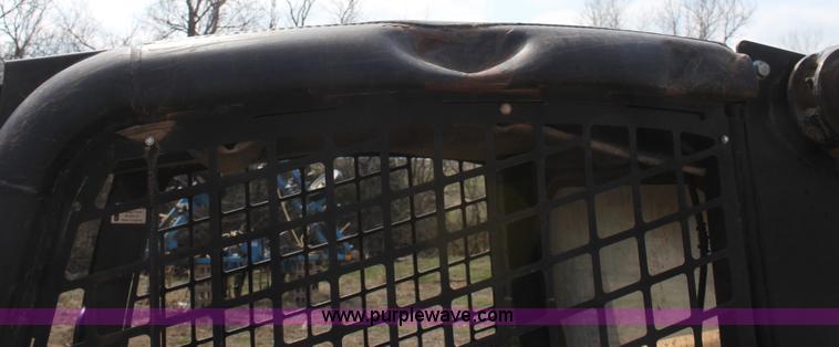 image for item F8712 1999 John Deere 250 skid steer