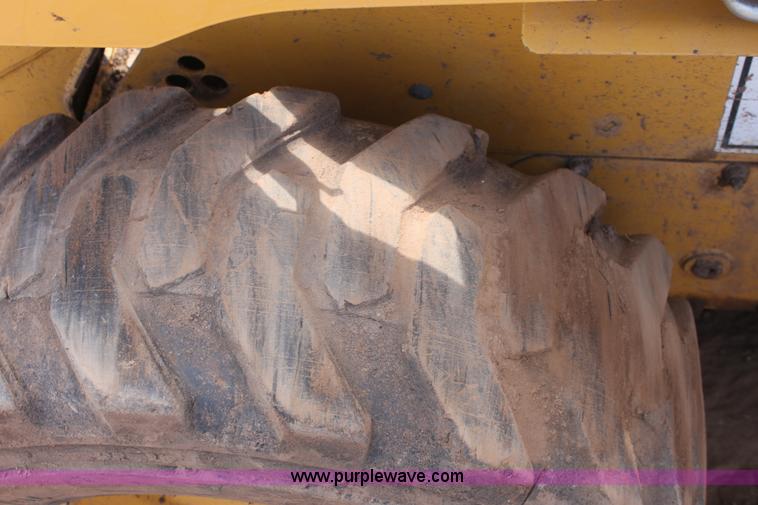 image for item F8712 1999 John Deere 250 skid steer