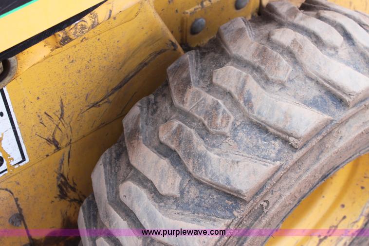 image for item F8712 1999 John Deere 250 skid steer