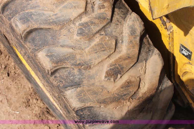 image for item F8712 1999 John Deere 250 skid steer