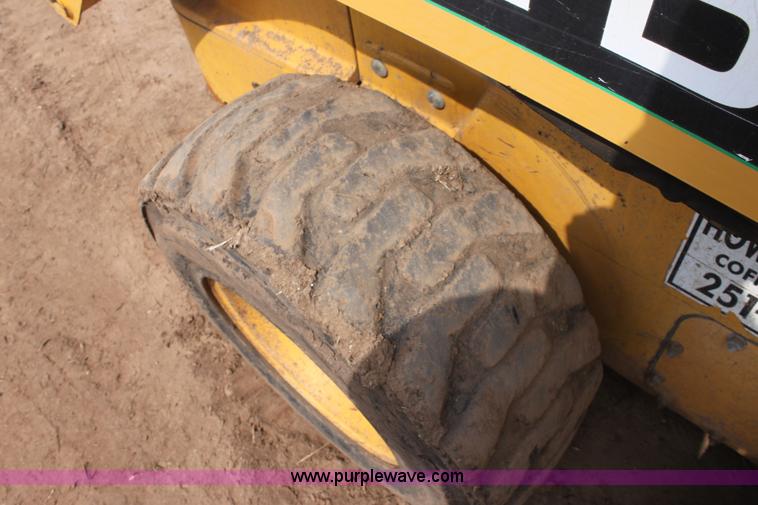 image for item F8712 1999 John Deere 250 skid steer