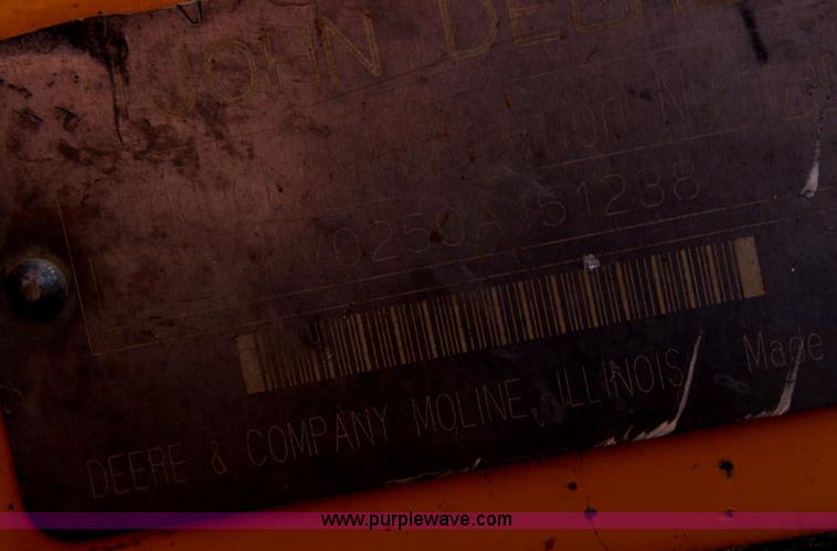 image for item F8712 1999 John Deere 250 skid steer