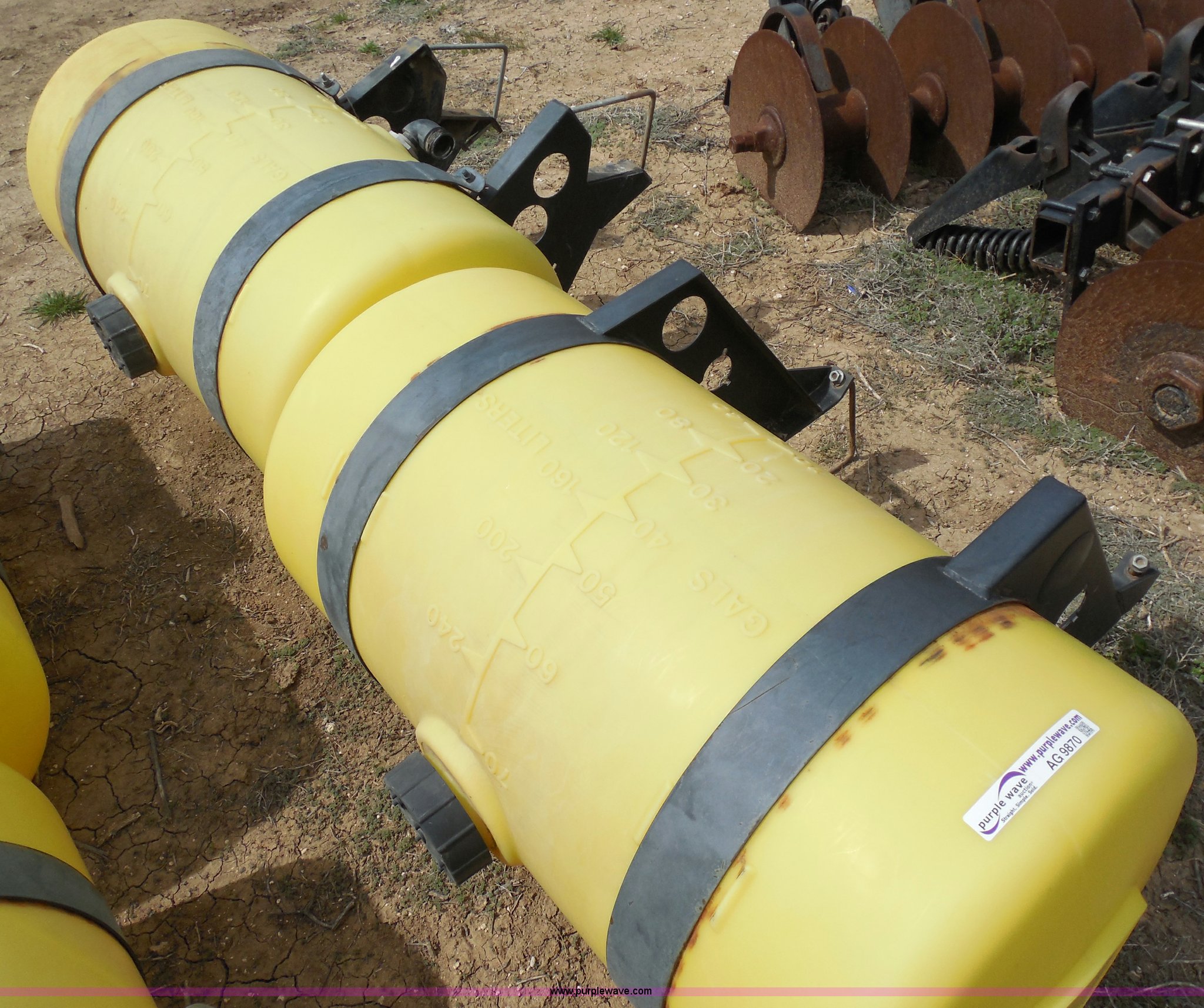 (2) John Deere 70 gallon liquid fertilizer tanks in Lyons, KS Item