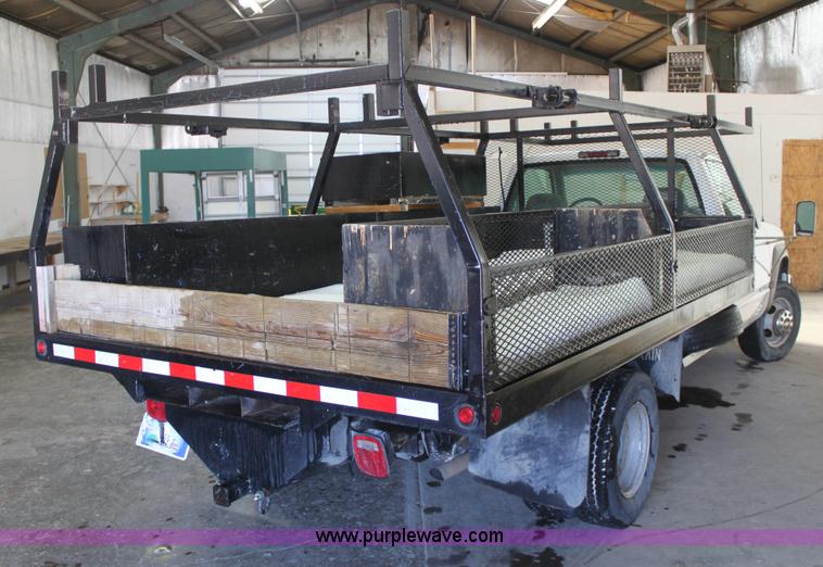 image for item AA9094 1999 Chevrolet 3500 LS flatbed pickup truck