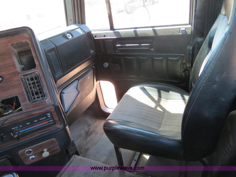 image for item B4683 1998 Freightliner FLD120 winch semi truck