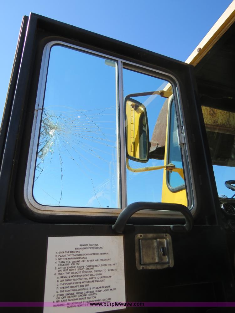 image for item B4701 Gradall G3WD rubber tire excavator