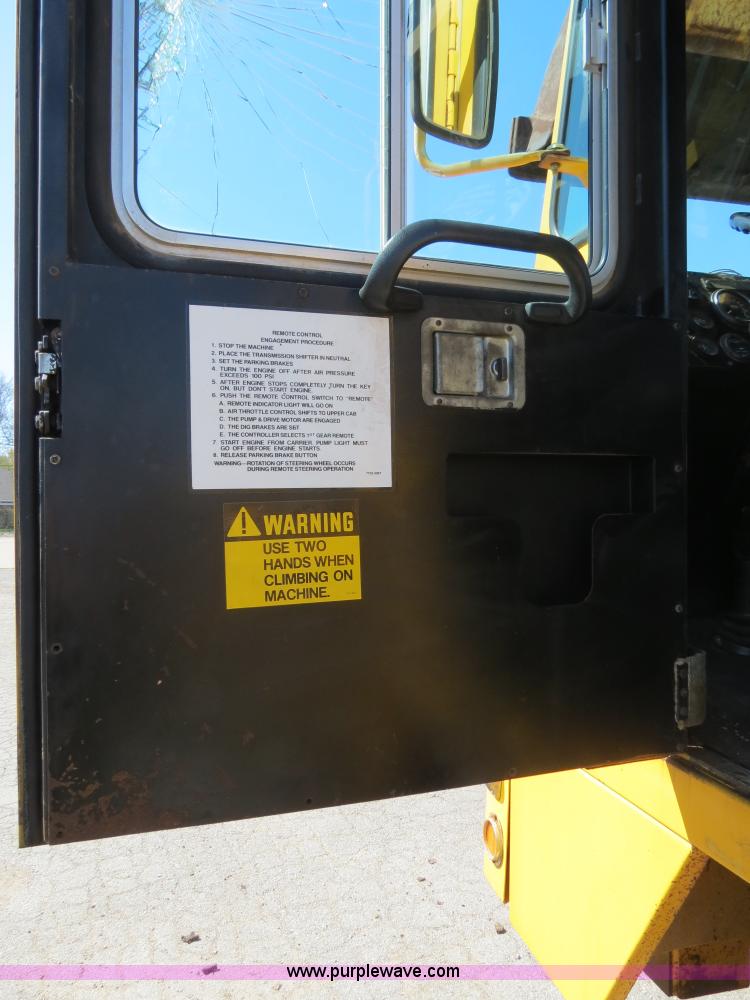 image for item B4701 Gradall G3WD rubber tire excavator