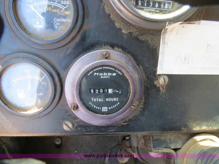 image for item B4701 Gradall G3WD rubber tire excavator