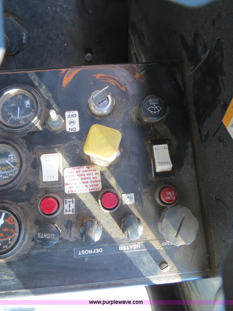 image for item B4701 Gradall G3WD rubber tire excavator