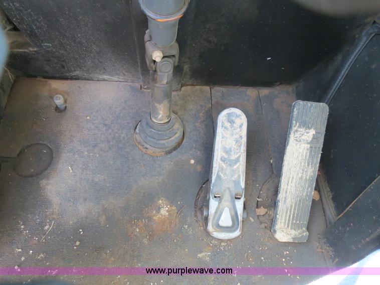 image for item B4701 Gradall G3WD rubber tire excavator