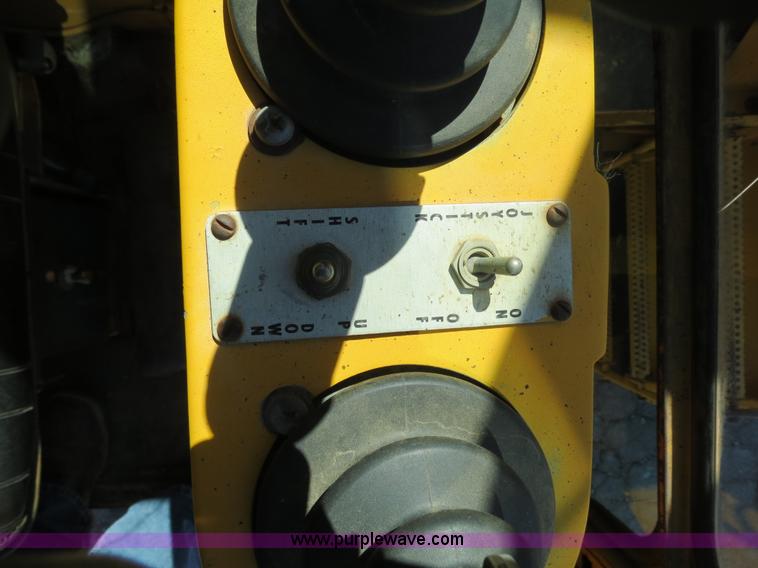 image for item B4701 Gradall G3WD rubber tire excavator