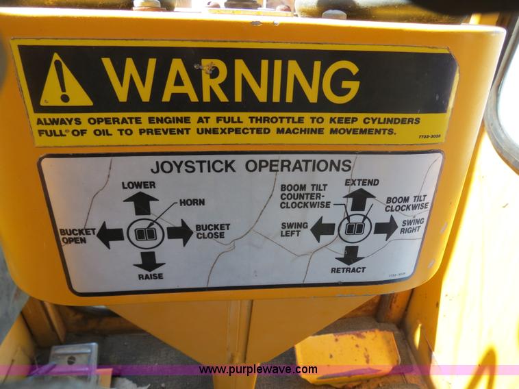 image for item B4701 Gradall G3WD rubber tire excavator