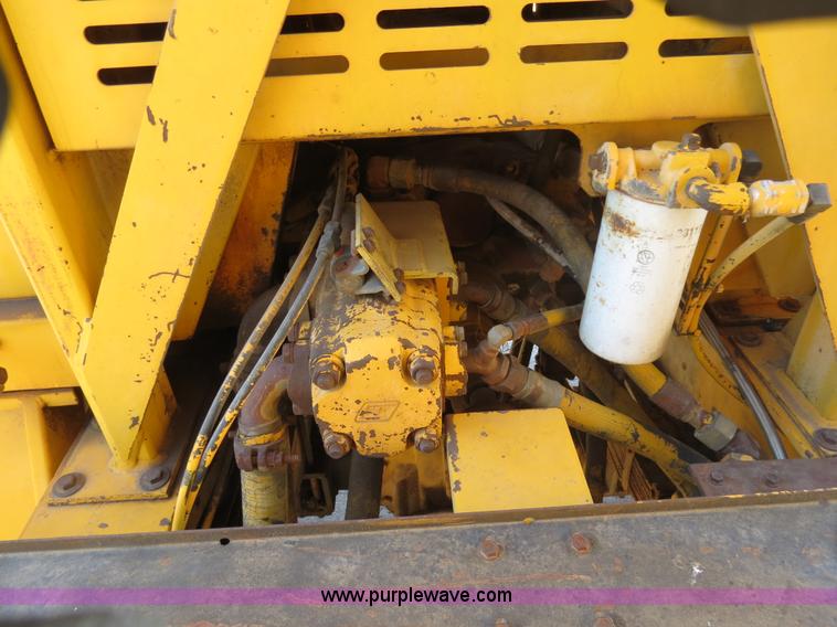 image for item B4701 Gradall G3WD rubber tire excavator