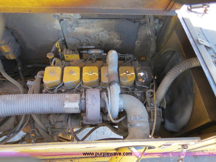 image for item B4701 Gradall G3WD rubber tire excavator